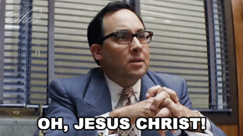 Man Wearing Glasses And Suit Says Oh Jesus Christ GIF