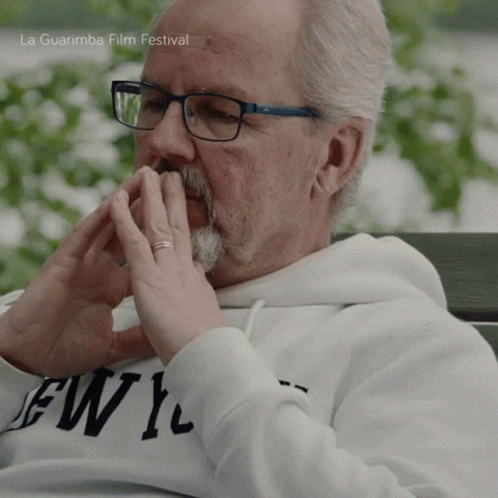 Man Wearing Glasses And Sweatshirt That Says Ewl GIF