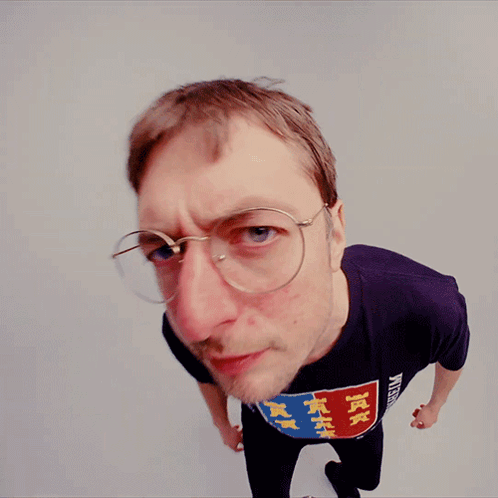 Man Wearing Glasses And Tax T-Shirt GIF