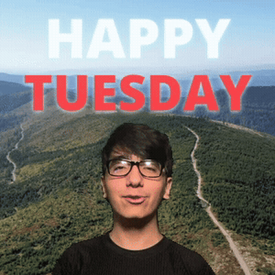 Man Wearing Glasses In Front Of Happy Tuesday GIF