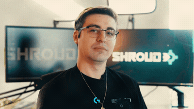 Man Wearing Glasses In Front Of Shroud Logo GIF