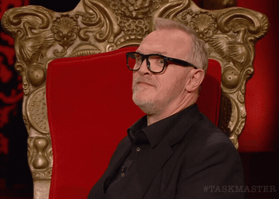 Man Wearing Glasses In Red Chair GIF