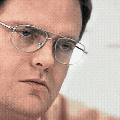 Man Wearing Glasses Looking At Camera GIF