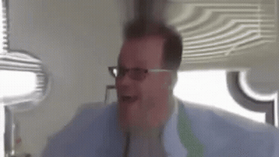 Man Wearing Glasses Making Funny Face GIF