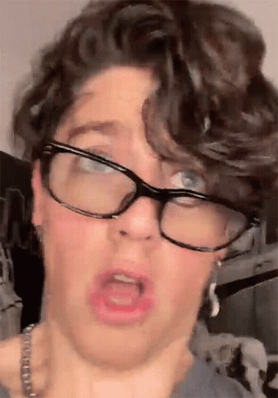 Man Wearing Glasses Making Funny Face GIF