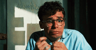 Man Wearing Glasses Making Funny Face GIF