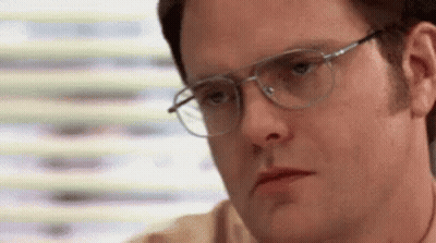 Man Wearing Glasses Making Serious Face GIF