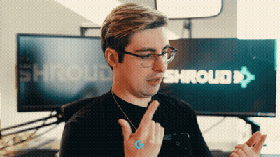 Man Wearing Glasses Pointing At Shroud Sign GIF