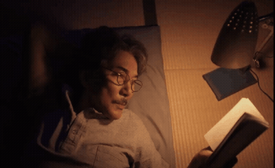 Man Wearing Glasses Reading Book GIF