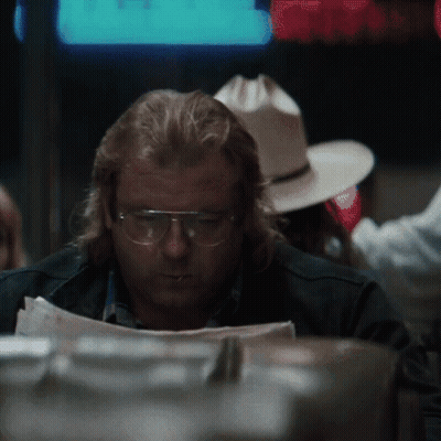 Man Wearing Glasses Reading Paper GIF