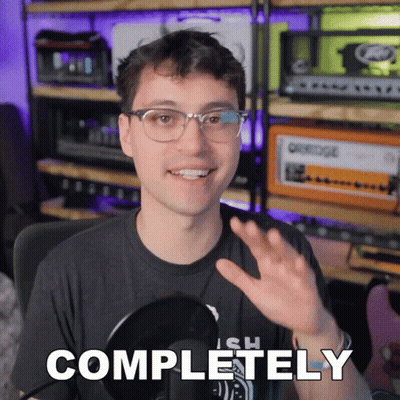 Man Wearing Glasses Says Completely While Waving GIF