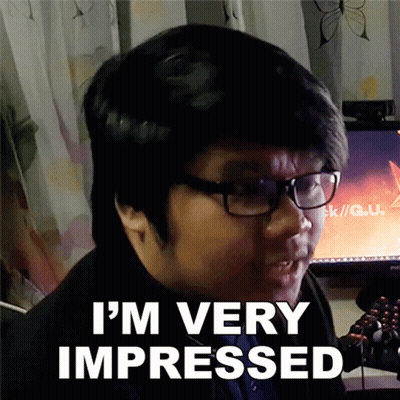 Man Wearing Glasses Says I'm Very Impressed In Front Of Computer Monitor GIF