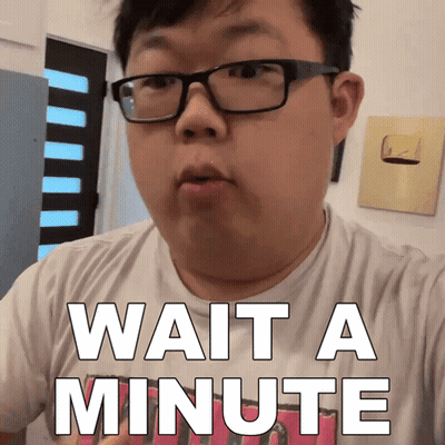 Man Wearing Glasses Says Wait A Minute GIF