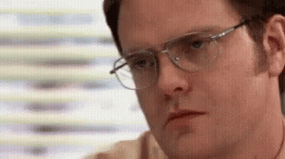 Man Wearing Glasses Sitting By Window GIF