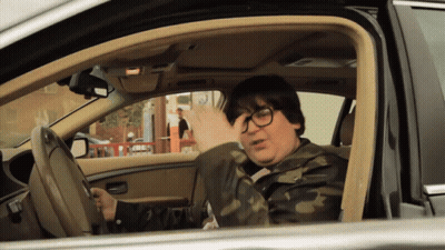 Man Wearing Glasses Sitting In Car GIF
