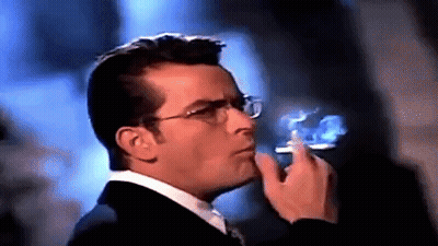 Man Wearing Glasses Smoking Cigarette GIF