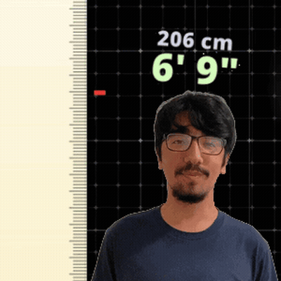 Man Wearing Glasses Standing By 206Cm Ruler GIF