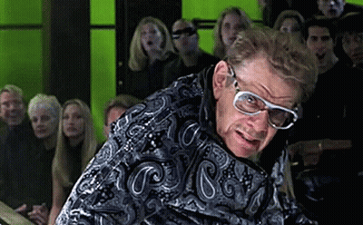 Man Wearing Glasses Standing In Crowd GIF