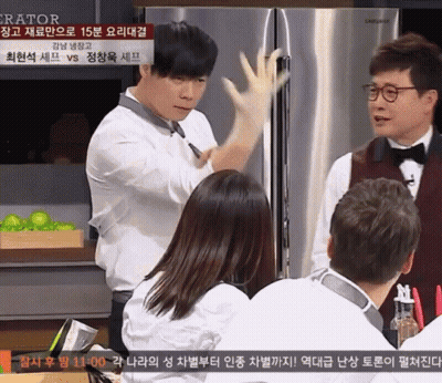 Man Wearing Glove In Front Of Refrigerator GIF