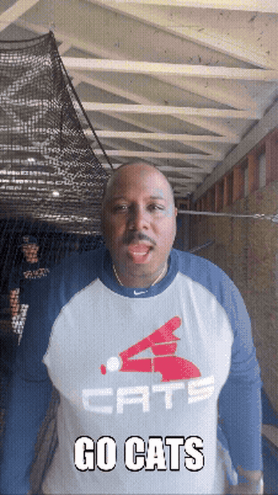 Man Wearing Go Cats Shirt GIF