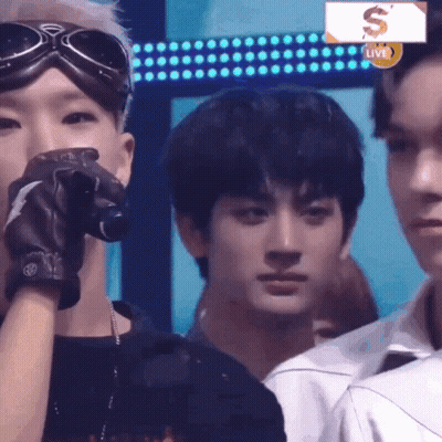 Man Wearing Goggles Holding Microphone GIF