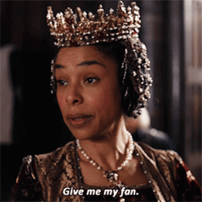 Man Wearing Gold Crown With Green Stone GIF