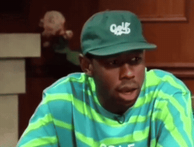 Man Wearing Green Hat And Striped Shirt GIF