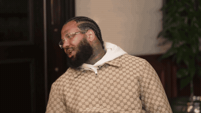 Man Wearing Gucci Jacket and Glasses