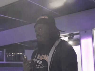 Man Wearing Hat And A&E Shirt GIF