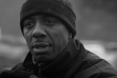 Man Wearing Hat And Headphones In Front Of Zowie Monitor GIF