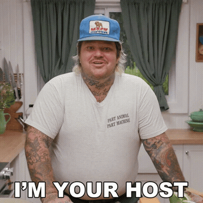 Man Wearing Hat And Part Animal Part Machine Shirt GIF