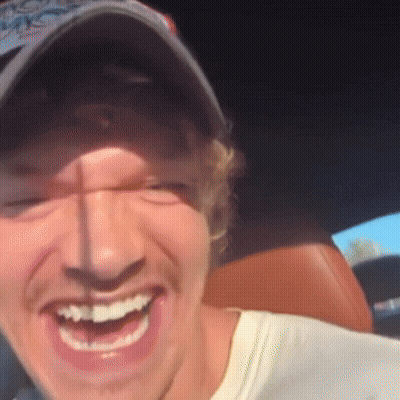 Man Wearing Hat And White Shirt Smiling GIF
