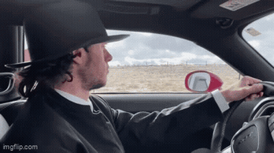 Man Wearing Hat Driving Car GIF