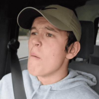 Man Wearing Hat Making Funny Face GIF