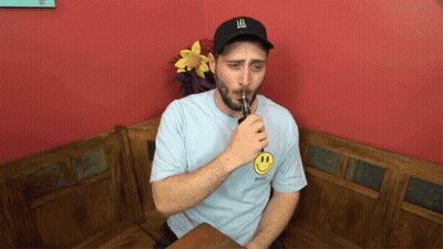 Man Wearing Hat Saying LL GIF