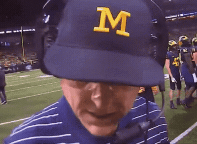 Man Wearing Hat That Says M GIF