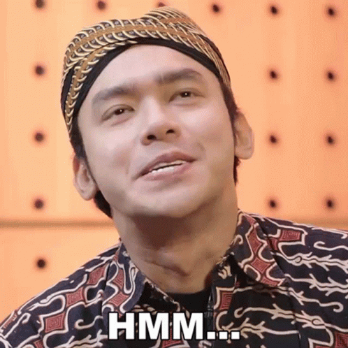 Man Wearing Headband Says Hmm GIF