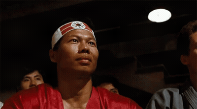 Man Wearing Headband With Chinese Symbol GIF