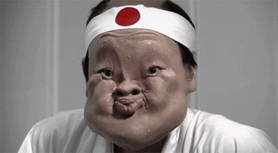 Man Wearing Headband With Red Circle GIF