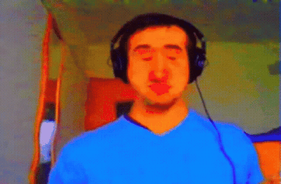 Man Wearing Headphones And Blue Shirt GIF