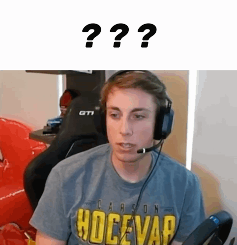 Man Wearing Headphones And Carson Hovepap Shirt GIF