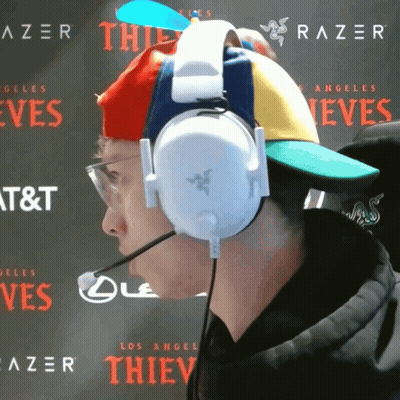 Man Wearing Headphones And Colorful Hat GIF
