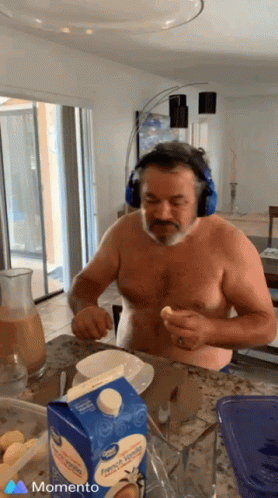 Man Wearing Headphones And French Vanilla Creamer GIF