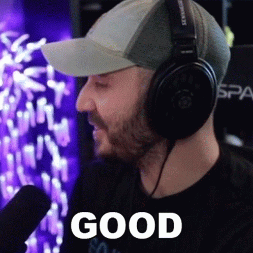 Man Wearing Headphones And Hat Says Good GIF