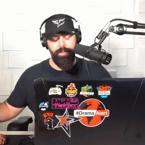 Man Wearing Headphones And Hat With Drama Alert Laptop GIF
