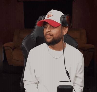 Man Wearing Headphones And Jets Hat GIF