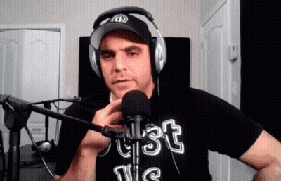 Man Wearing Headphones And Just Us Shirt GIF