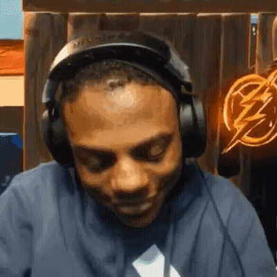 Man Wearing Headphones And Lightning Bolt Shirt GIF