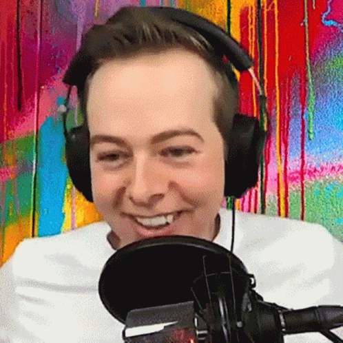 Man Wearing Headphones And Microphone Smiling GIF
