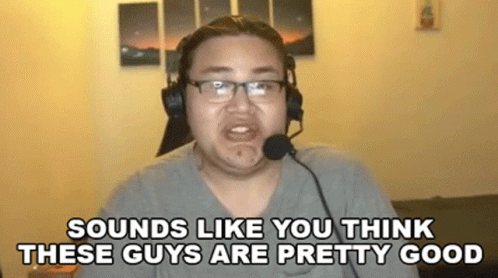 Man Wearing Headphones And Microphone Talking Into Microphone In Front Of Camera GIF